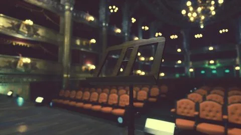 Empty Auditorium With Rows of Seats and Chandelier Stock Illustration