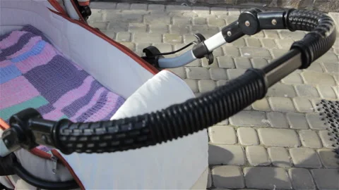 Empty baby stroller Stock Footage 99775792
