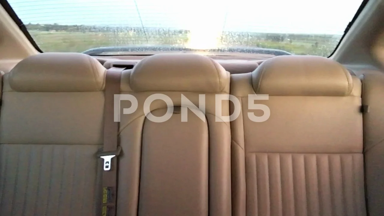 https://images.pond5.com/empty-back-seats-while-driving-footage-095378461_prevstill.jpeg