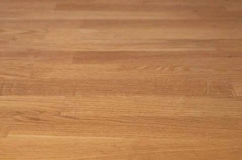 An empty backdrop with a natural wooden tabletop creates a sense of simplicit Stock Photos