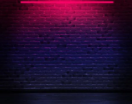 Empty background of an old brick wall, neon light. Dark room with brick walls. N Stock Photos