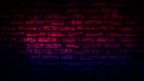 Empty background of an old brick wall, neon light. Dark room with brick walls. Stock Photos