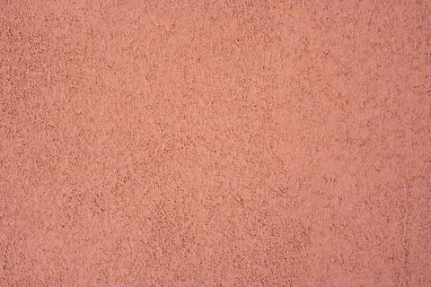 Empty background. Orange wall, porous texture. Stock Photos