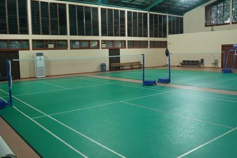 Empty badminton court for the competing Stock Photos