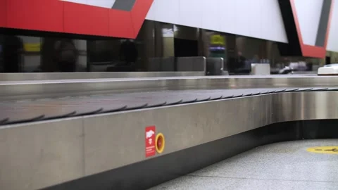 Empty baggage carousel at the airport in the baggage claim area Stock Footage 292387929