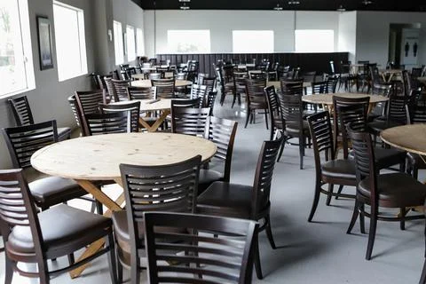 Empty ballroom, with several round tables Stock Photos