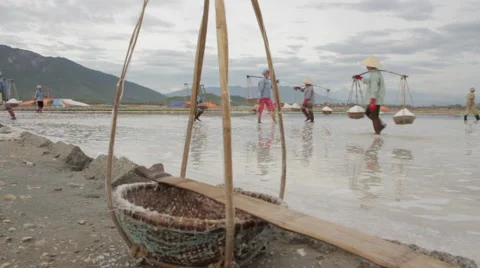 Empty bamboo baskets Workers in Background Stock Footage 42415775