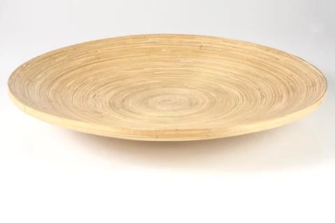 Empty bamboo plate on white background isolated Stock Photos