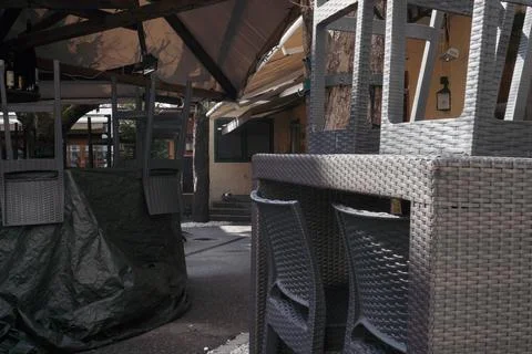 Empty bar with chairs up to the table, to be opened soon. Quiet, modern int.. Stock Photos