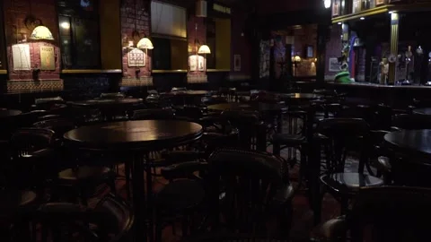 Empty bar during quarantine. Lots of empty tables and a bar. Stock Footage 139151022