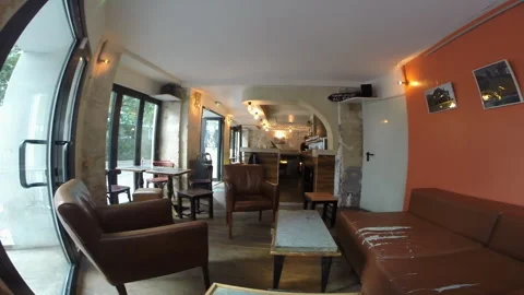 Empty Bar Lounge Interior Low Angle Wide Shot with Damaged Leather Sofas Stock Footage 347220670
