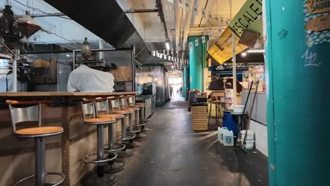 Empty Bar Stools and Food Stalls in Bordeaux Indoor Market Stock Footage 334827708