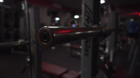 Empty barbell on rack Stock Footage 118856638