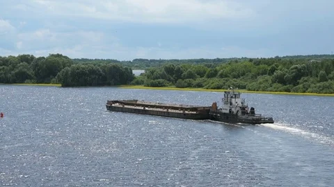 Empty barge on river on summer warm day Stock Footage 82629394