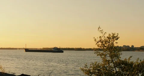 Empty barge waiting for loading. A moored ship with container cranes Stock Footage 129116356