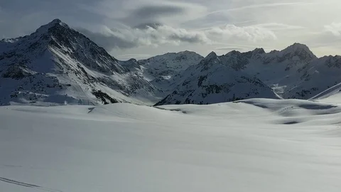 Empty Barren Landscape of Snow and Clouds on the Mountain Video stock 123554280