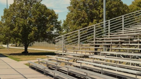 Empty Baseball Bleachers and Walkway With Slow Right to Left Pan Video stock 336804469