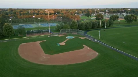 Empty Baseball Diamond At Andrews Park Champlin Minnesota - Rotating Drone Shot Stock Footage 225603902