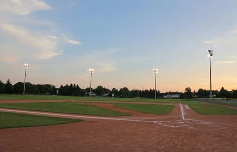 Empty Baseball Diamond at Sunset Stock Photos