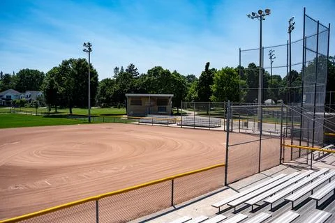 Empty baseball diamond viewed from stadium bleachers Stock Photos