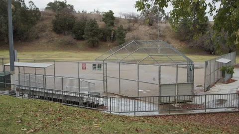 Empty Baseball Field After Rain Covid 19 Coronavirus Lockdown Quarantine Stock Footage 147576503