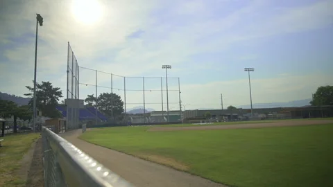 Empty baseball field under sun Видео 211878679