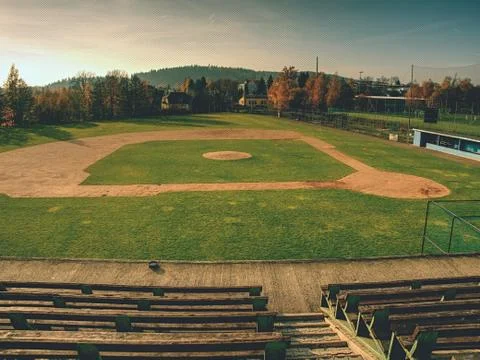 Empty baseball green field view grandstand. Stock Photos