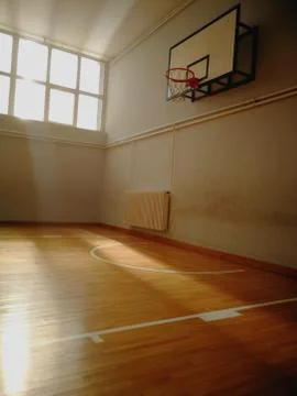 Empty basketball hall Stock Photos