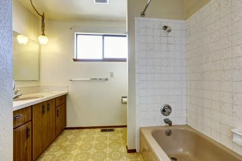 Empty bathroom interior in old house Stock Photos