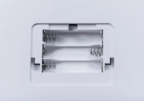 Empty battery compartment in an electronic device. Close-up Stock Photos