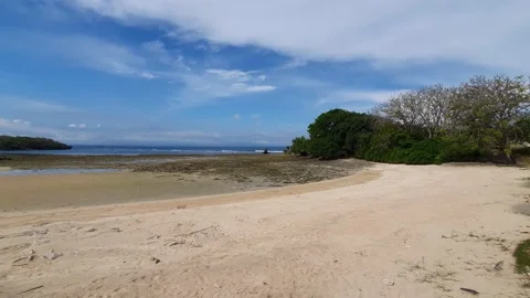 Empty bay at low tide on the the beautiful Nusa Dua beach, Bali, Indonesia Stock Footage 147938492
