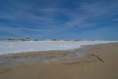 Empty beach after snowfall Stock-Fotos