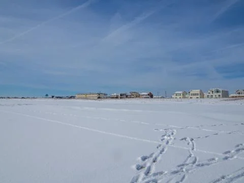 Empty beach after snowfall Stock Photos