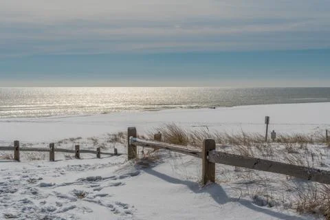Empty beach after snowfall Stock Photos