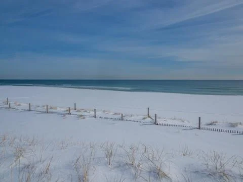Empty beach after snowfall Stock Photos