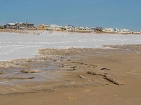 Empty beach after snowfall Stock Photos