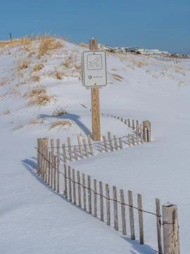 Empty beach after snowfall Stock Photos