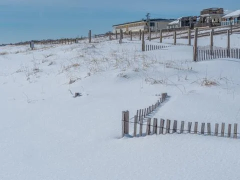 Empty beach after snowfall Stock Photos