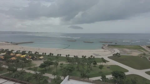 Empty beach and cityscape in Chatan, Okinawa during tsunami warning Stock Footage 325678008