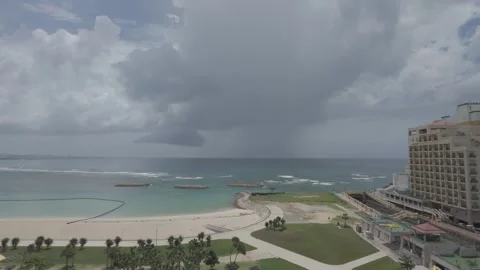 Empty beach and cityscape in Chatan, Okinawa during tsunami warning Stock Footage 325680847