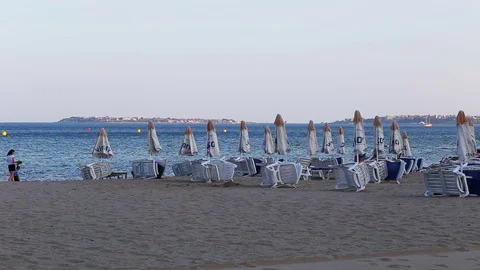 Empty beach and empty chaise-longue Video stock 72472610