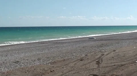 Empty beach and turned over boat Stock Footage 37278078