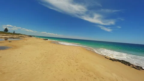 Empty beach in Australia. Flying on an FPV drone. Stock Footage 243556028