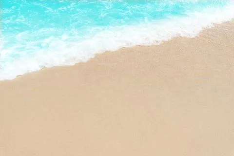 Empty beach background. Sand and blue sea with copy space Stock Photos