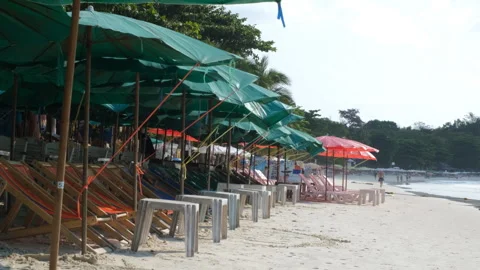 Empty beach cafe tables set up in morning Stock Footage 332846847