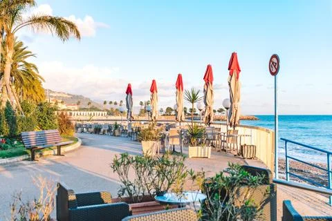 Empty beach cafe without visitor, people. Empty Beach chair, table, bay, seas Stock Photos