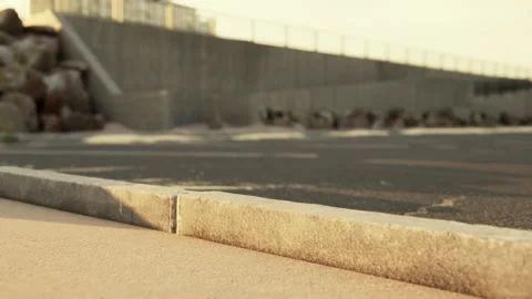 Empty beach car park spaces covered in asphalt. Video stock 237887970