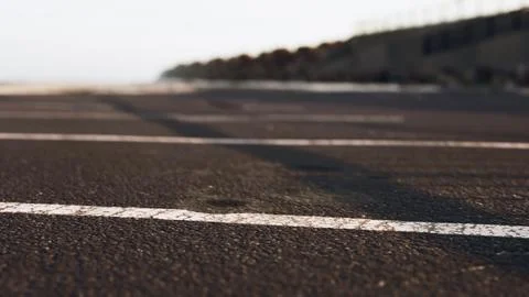 Empty beach car park spaces covered in asphalt. Stock Illustration