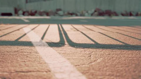 Empty beach car park spaces covered in asphalt. Ilustração Stock