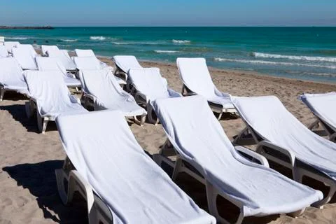 Empty beach chairs Stock Photos